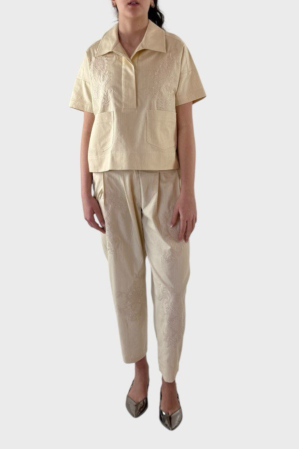 Completo avorio ricamato con top e pantalone