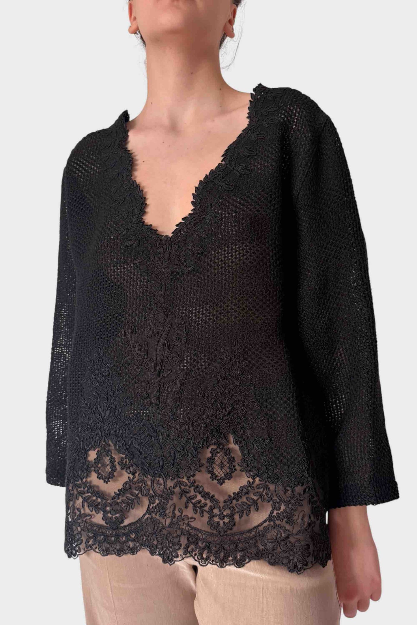 Maglia traforata in lino con schiena scoperta