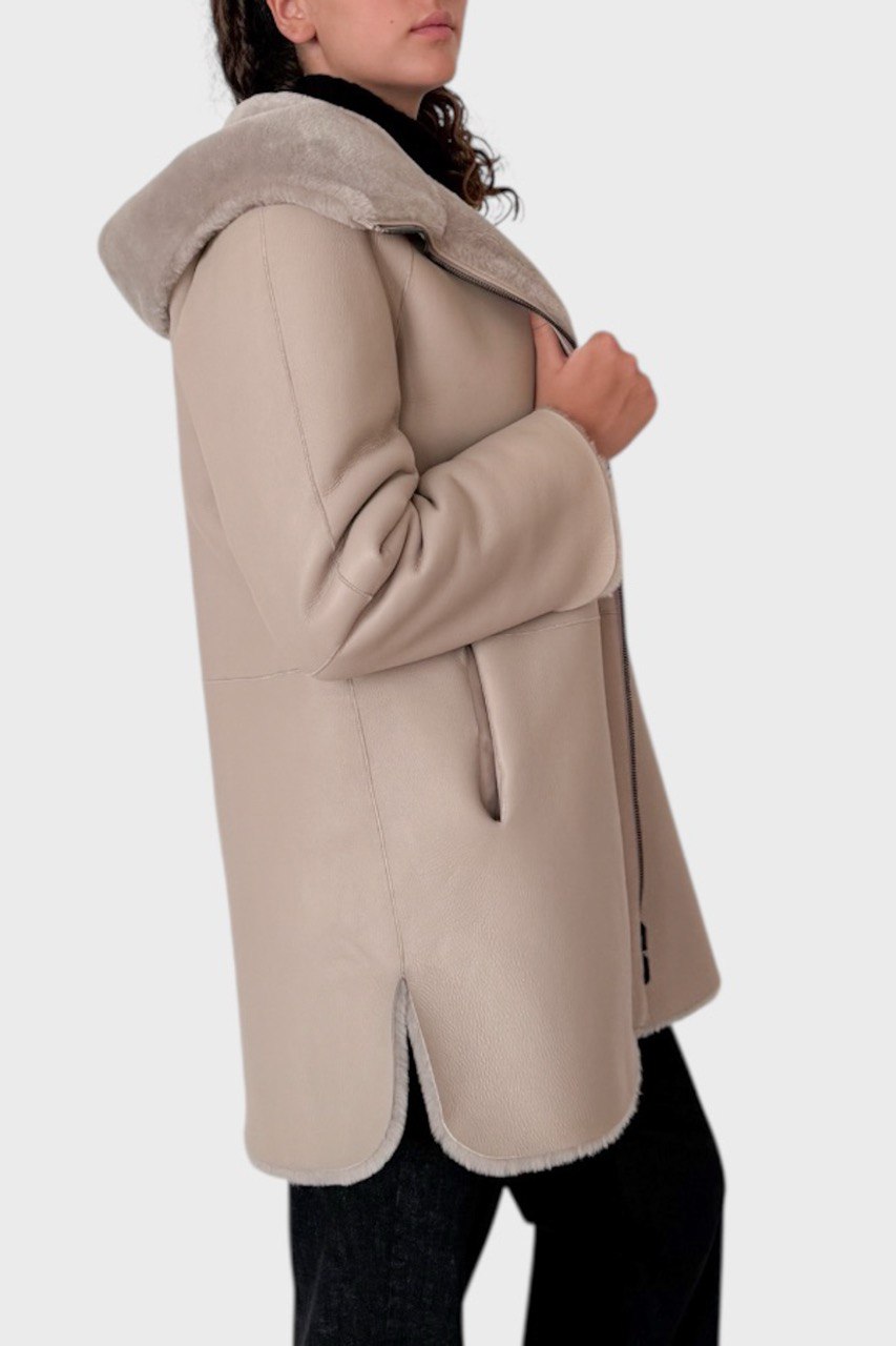 Montone con cappuccio reversibile