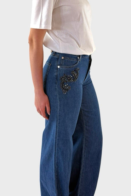 Jeans con applicazione gioiello