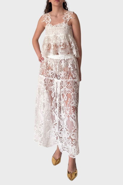 Top in pizzo bianco con spacco su schiena